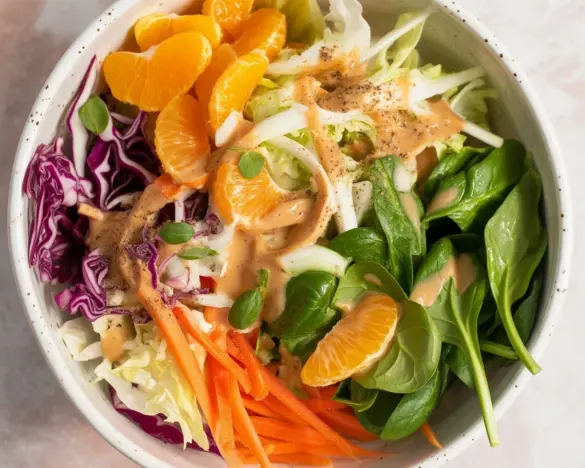 Whole30 Orange Chicken Salad with mandarins and fresh vegetables for a healthy meal.