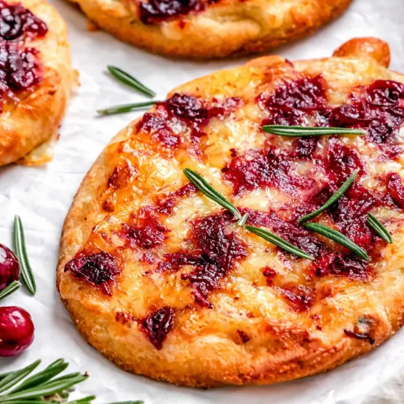 Crispy flatbread topped with creamy brie, tart cranberries, and toasted walnuts.